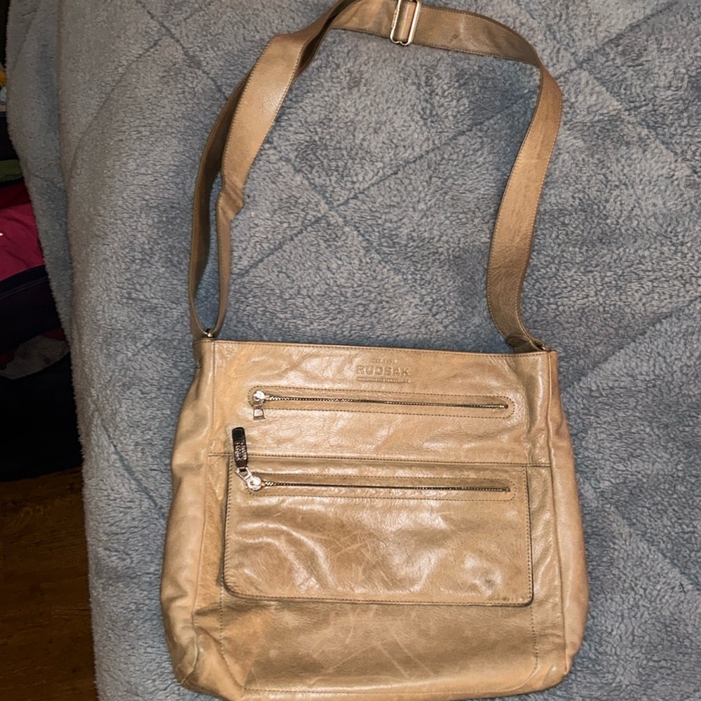 RUDSAK High Quality Leather Bag with Interior Flashlight & Multiple Compartments